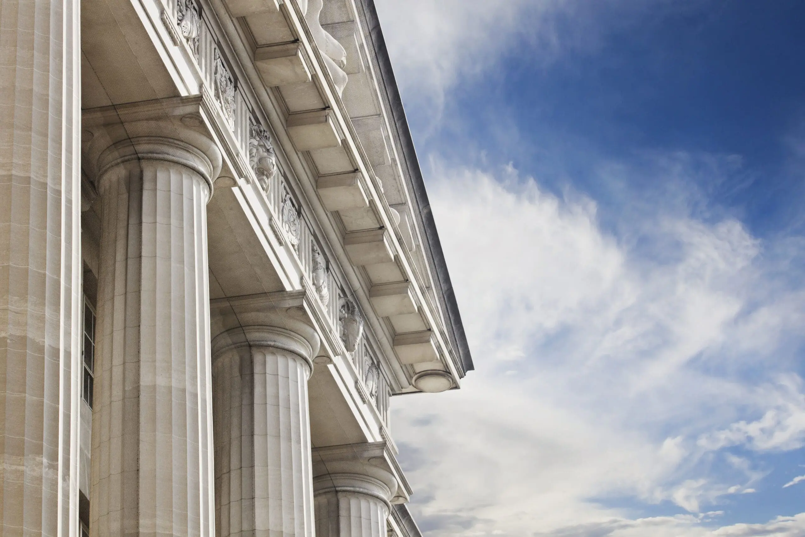 A close up look at a courthouse or government building with lots of copy space to the right